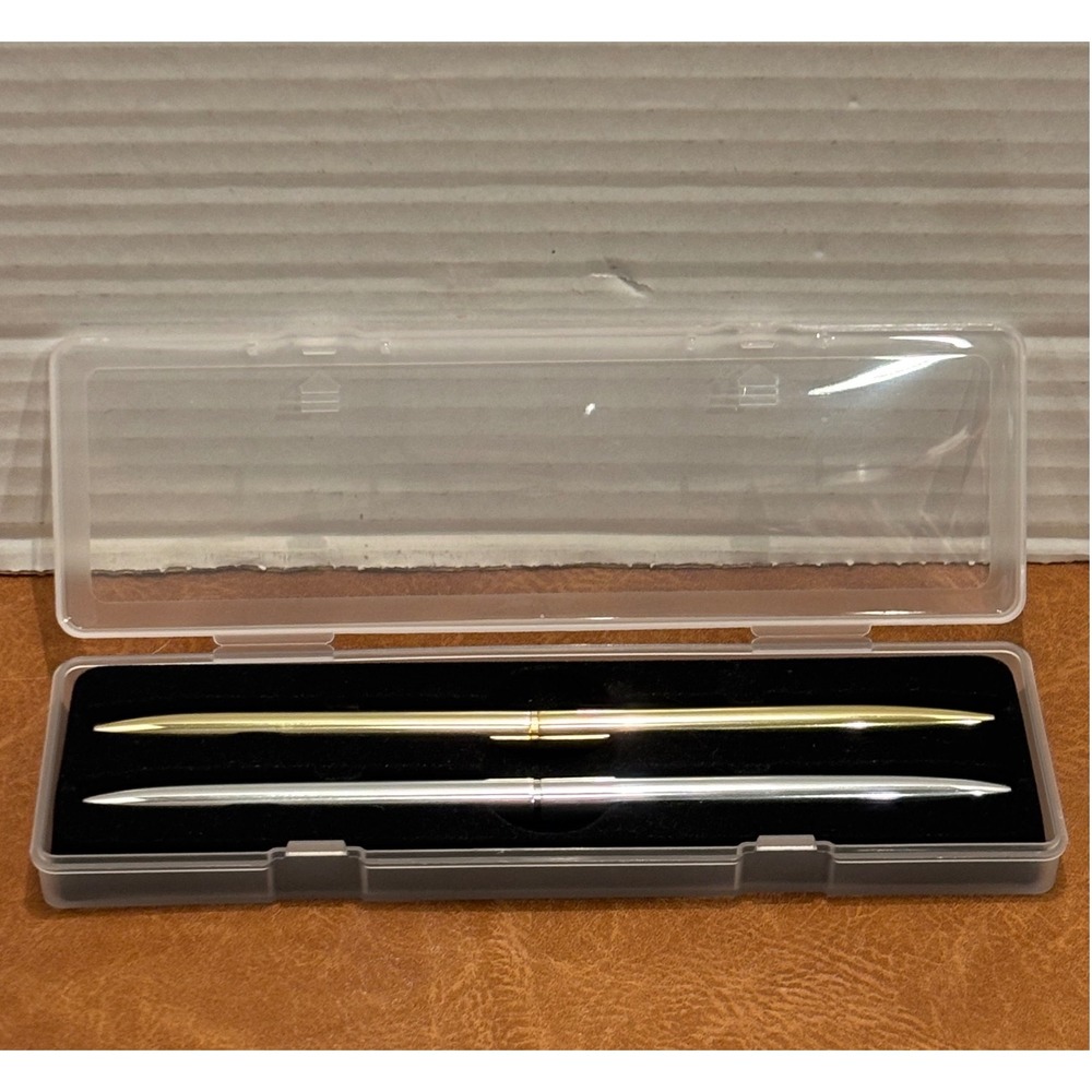 Vintage Slim Minimalist Metal Twist Pens 1 Gold and 1 Silver with storage case.